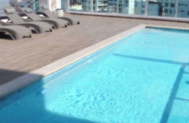 Cozy 1-Bedroom Apt in the Heart Bella Vista, Sto Dgo. ROOFTOP, GYM,POOL.PARKING.