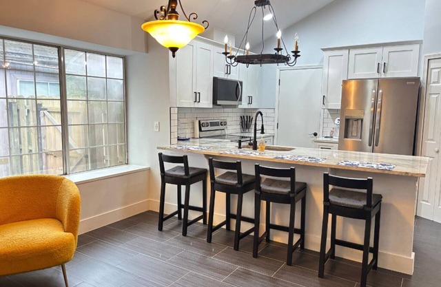 Cozy 2BR Getaway with Patio & Garage Near Shops, Dining & Highways!