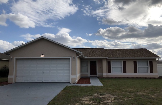 Cozy 4 bedroom 2 bathroom Pool Home with game room Close to all the parks.