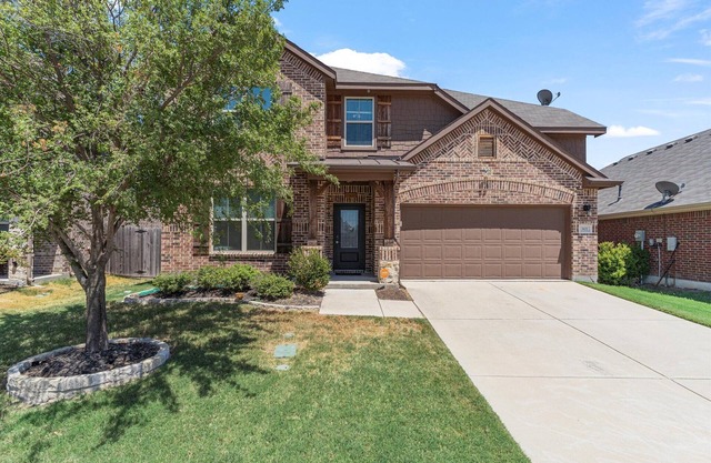 Cozy 4 bedroom 3.5 bath home located in the heart of Little Elm.