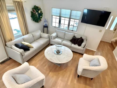 Cozy 4BR 3BA Home- Train to NYC, USOpen, CitiField Mets, Walk to Harbor & Golf