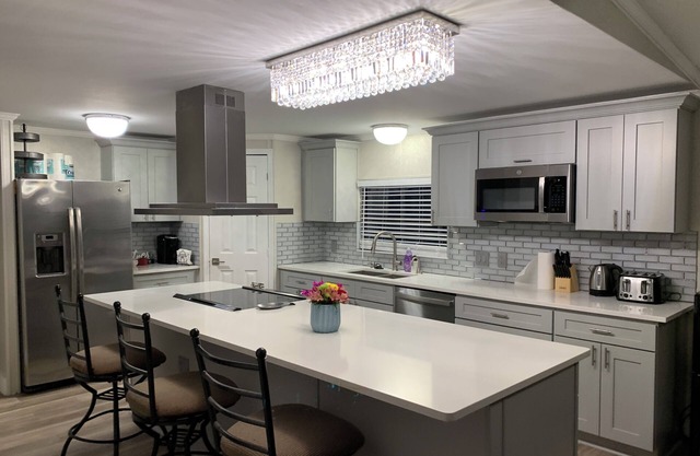 Cozy 5 Bedroom 85” TV Home in a Secluded Area