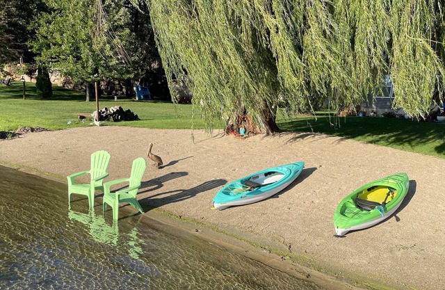 Cozy Beach Getaway with Private Sandy Beach & Dock, 2 Paddle Boards, & 2 Kayaks