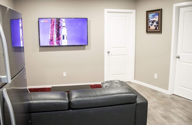 COZY BRAND NEW LEGAL SUIT IN LIVINGSTON CALGARY