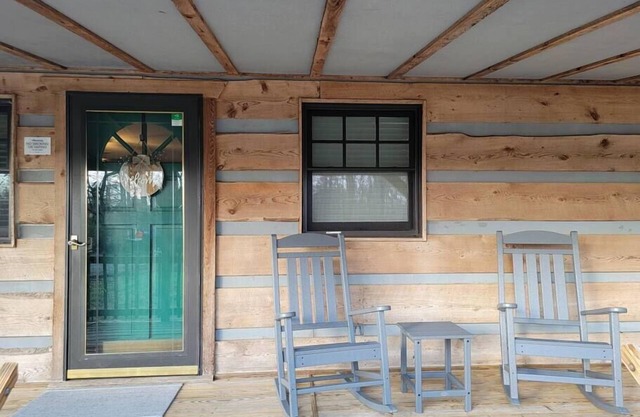 Cozy cabin inviting you to "Just Breathe"