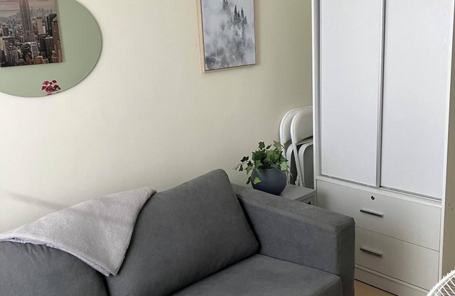 Cozy condo with AC and fitness room in lovely Dumaguete steps from the Ocean