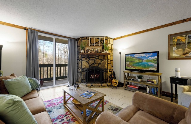 Cozy Condo with Wood-burning FP & Patio Gliders