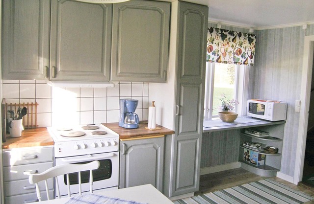 Cozy cottage is situated elevated and in a scenic, quiet environment.