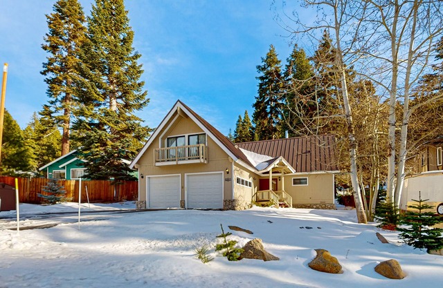 Cozy home with spacious deck, open floor plan, fireplace, nearby activities