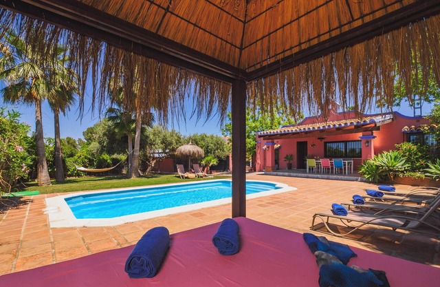 Cozy house with pool and private gardens.