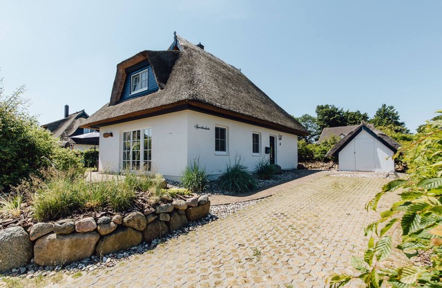 Cozy thatched house on the Baltic Sea