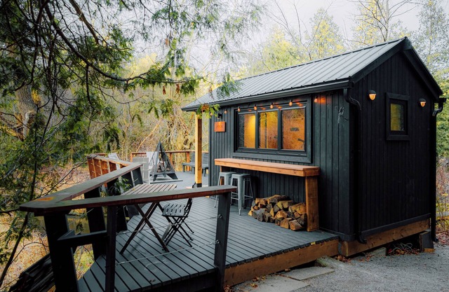 Cozy tiny house surrounded by a private forest near Toronto .