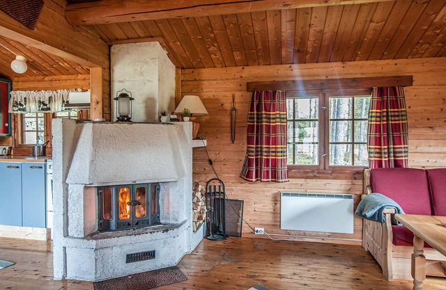 Cozy wooden cottage near the river Glomma.
