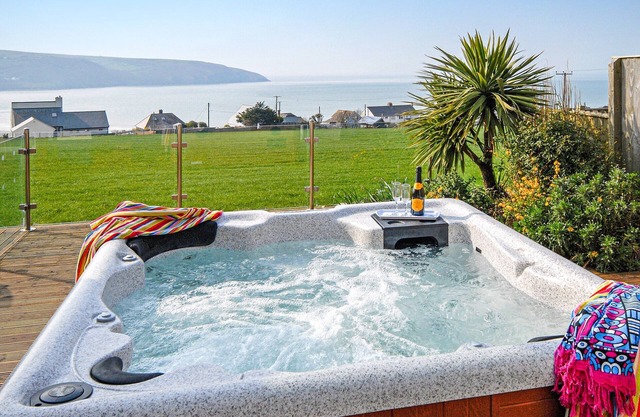 Craig Silian is a gorgeous holiday house with luxury feature of a hot tub in the garden.