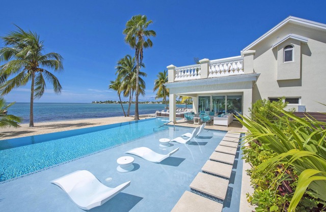 Crystal Waters: Luxe Villa w/Private Pool, Dock and Barefoot Beach Lounge - Walk to The Kaibo!