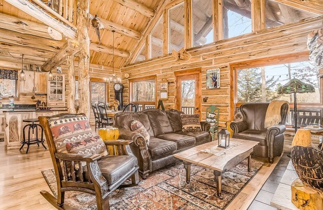 Delightful Riverfront Cabin with Wood-Burning Fireplace and Gas Grill & Hot Tub