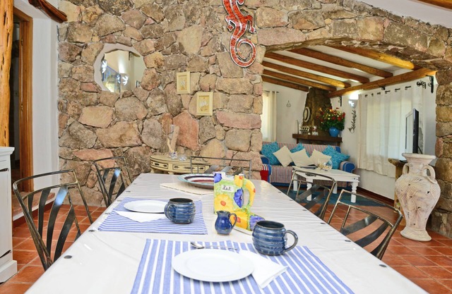 Detached villa in local stone with private pool.