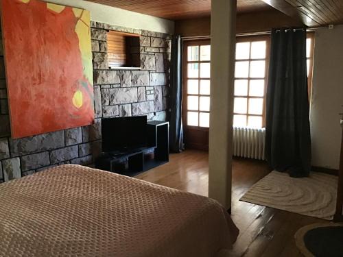 Deux grandes chambres en rez-de-jardin