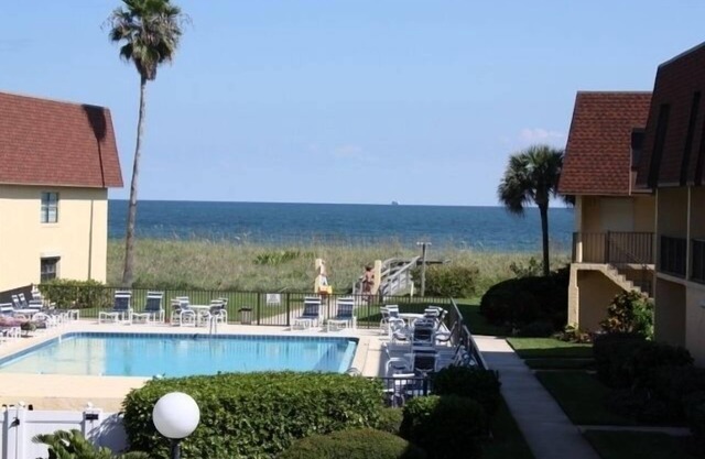Direct Beach Access, ground floor corner unit, freshly updated in cozy setting.