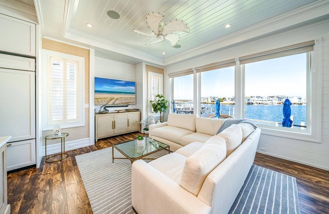 Discover the epitome of coastal living in this exceptional bayfront residence, a true gem boasting.