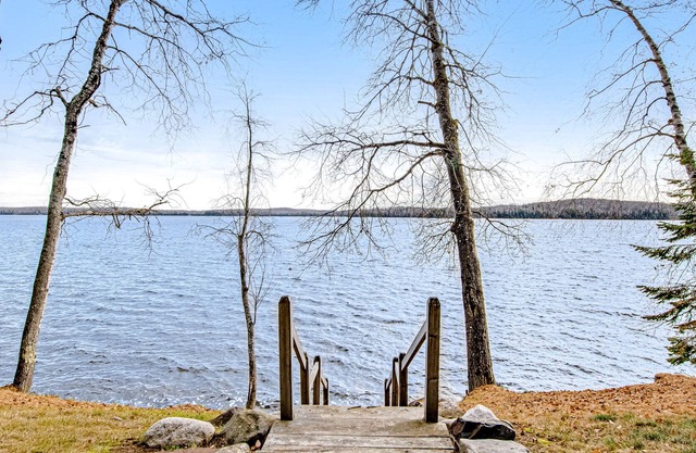 Dog-friendly cabin with waterfront views, lake access, sandy beach, & rec room