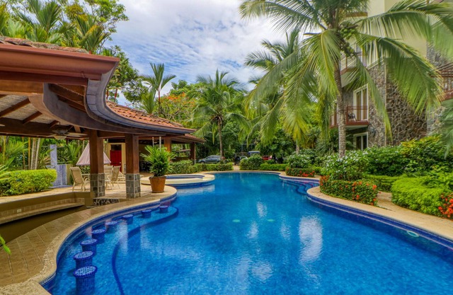 Dog-friendly condo with balcony, AC, WiFi, & pool - near downtown Jaco & beach