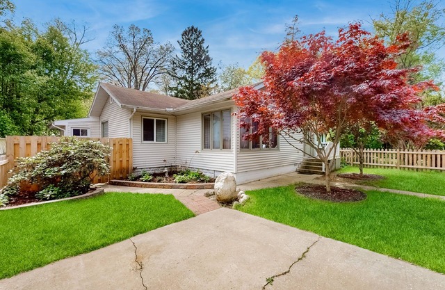 Dog-friendly home in the perfect location with enclosed yard, streaming, & W/D