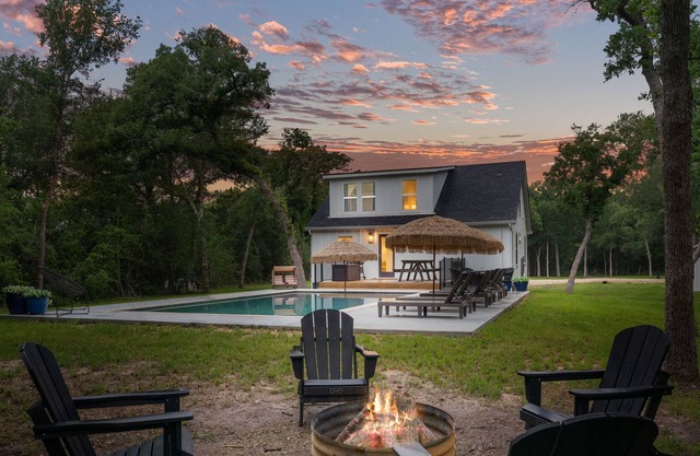 Dog-friendly home on an acreage with pool, firepit
