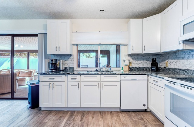Dog-friendly home with fenced yard & screened patio - near beach & Dodgertown
