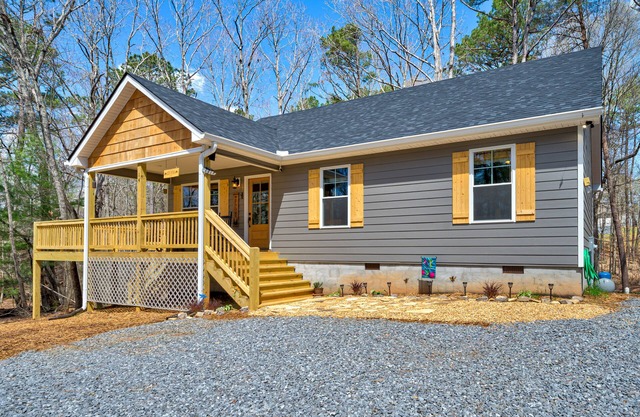 Dog-friendly home with wraparound deck, firepit, grill, WiFi, and gas fireplace