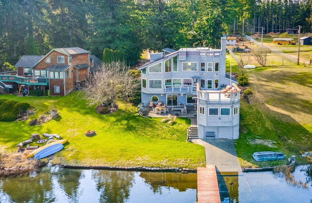 Dog-friendly, lakefront home with dock, deck and game room