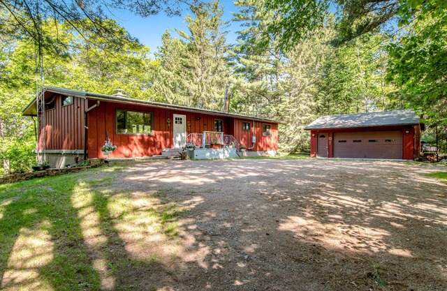Dog-friendly, lakefront home with dock, kayaks, canoe, bike & fireplace