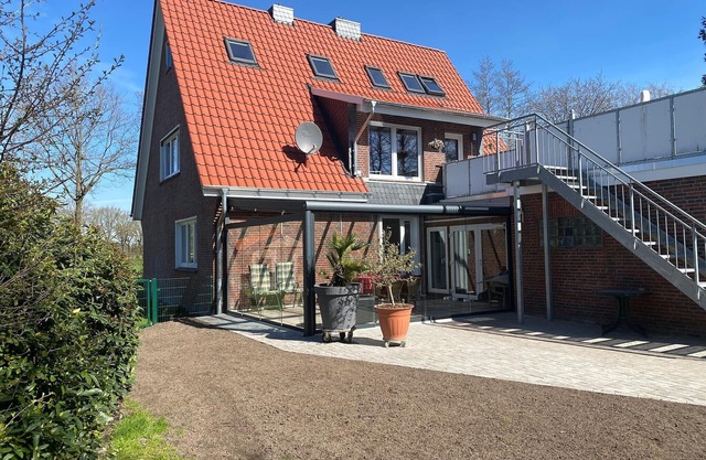 Dog-friendly vacation apartment in East Frisia with fenced garden
