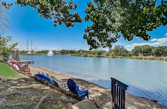 Dog-friendly water view condo with inviting porch, AC, W/D, & modern charm