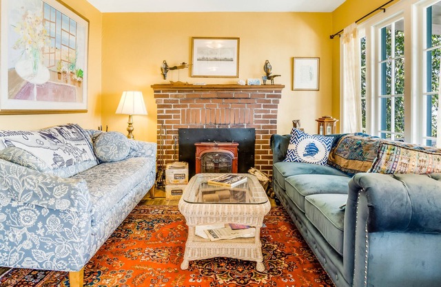 Dog-friendly waterfront home with private hot tub, views & wood stove