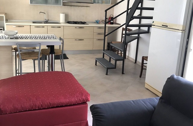 Double room by the sea at Capomulini Bay.
