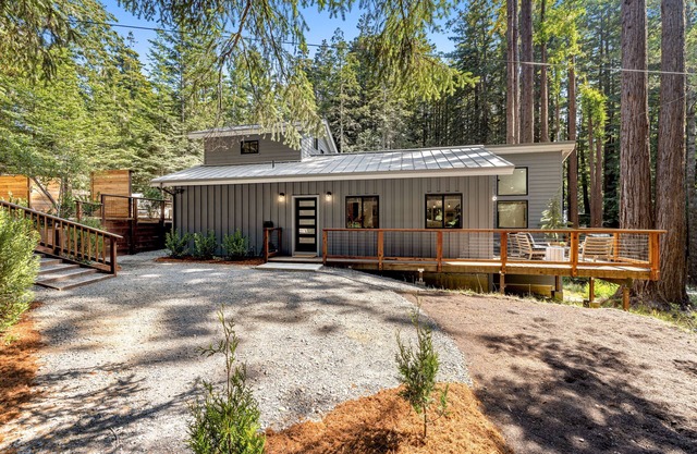 Dreamy home with expansive patio & alfresco dining, private hot tub, yard & W/D