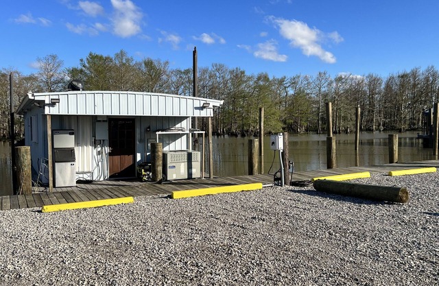 Drive up & park 6 ft from this clean, equipped houseboat in Cypress Cove Marina