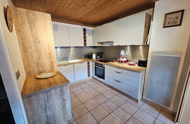 Duplex apartment in a quiet residence in the centre of the village