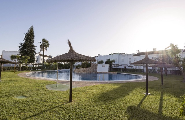 DUPLEX NEAR THE BEACH - Charming house with shared pool and free WiFi.