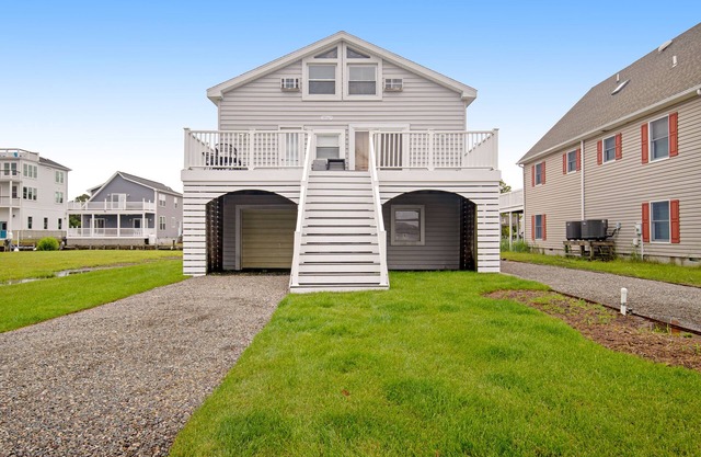 Edgewater Acres waterfront home with dock, bay access, & outdoor dining