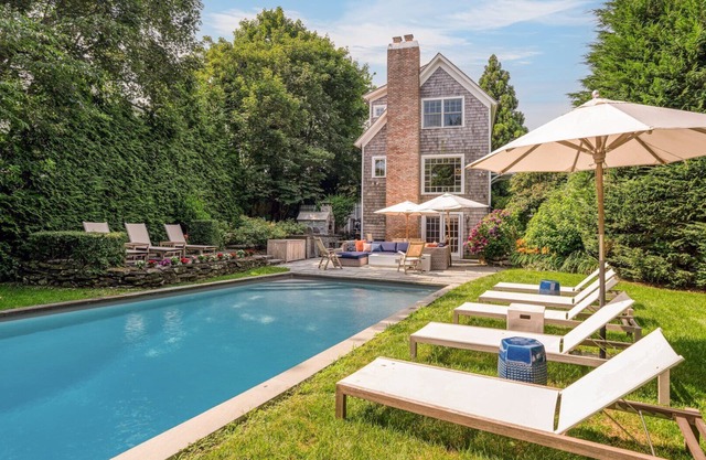 Elegant Coastal Escape with Expansive Yard, Heated Pool, and Outdoor.