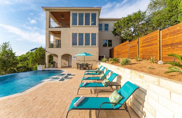 Elegant Lakeside Home w/Infinity Pool, Game Room, & Scenic Views