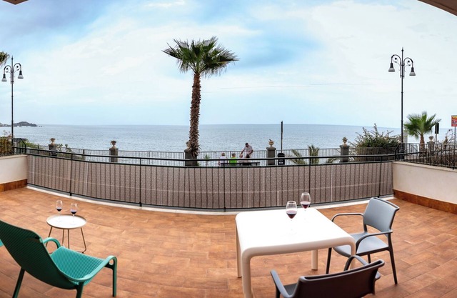 Elegant Seafront Apartment with Parking Space
