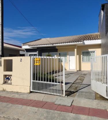 EM CASA