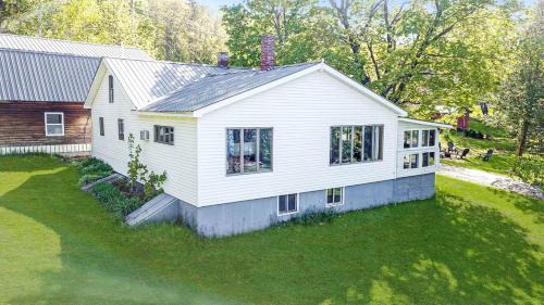 Embrace Nature in this Breathtaking Cottage in Portage Lake, Maine
