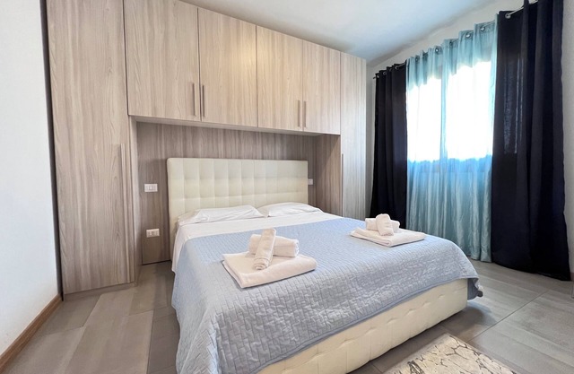 Emerald Booking Apartment in historic center with covered terrace 2 rooms.