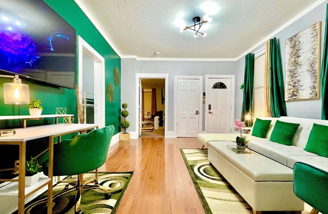 Emerald Oasis: Cozy Tremont 1BR Lower Unit by Christmas Story House | Parking 7 Min to Downtown
