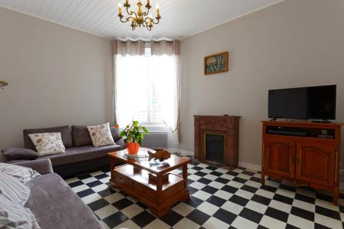 En plein centre, jolie maison pour 6 avec jardin