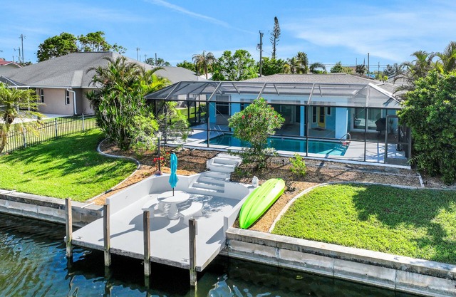 Enchanting waterfront home with pool, dock, washer/dryer, & dog-friendly